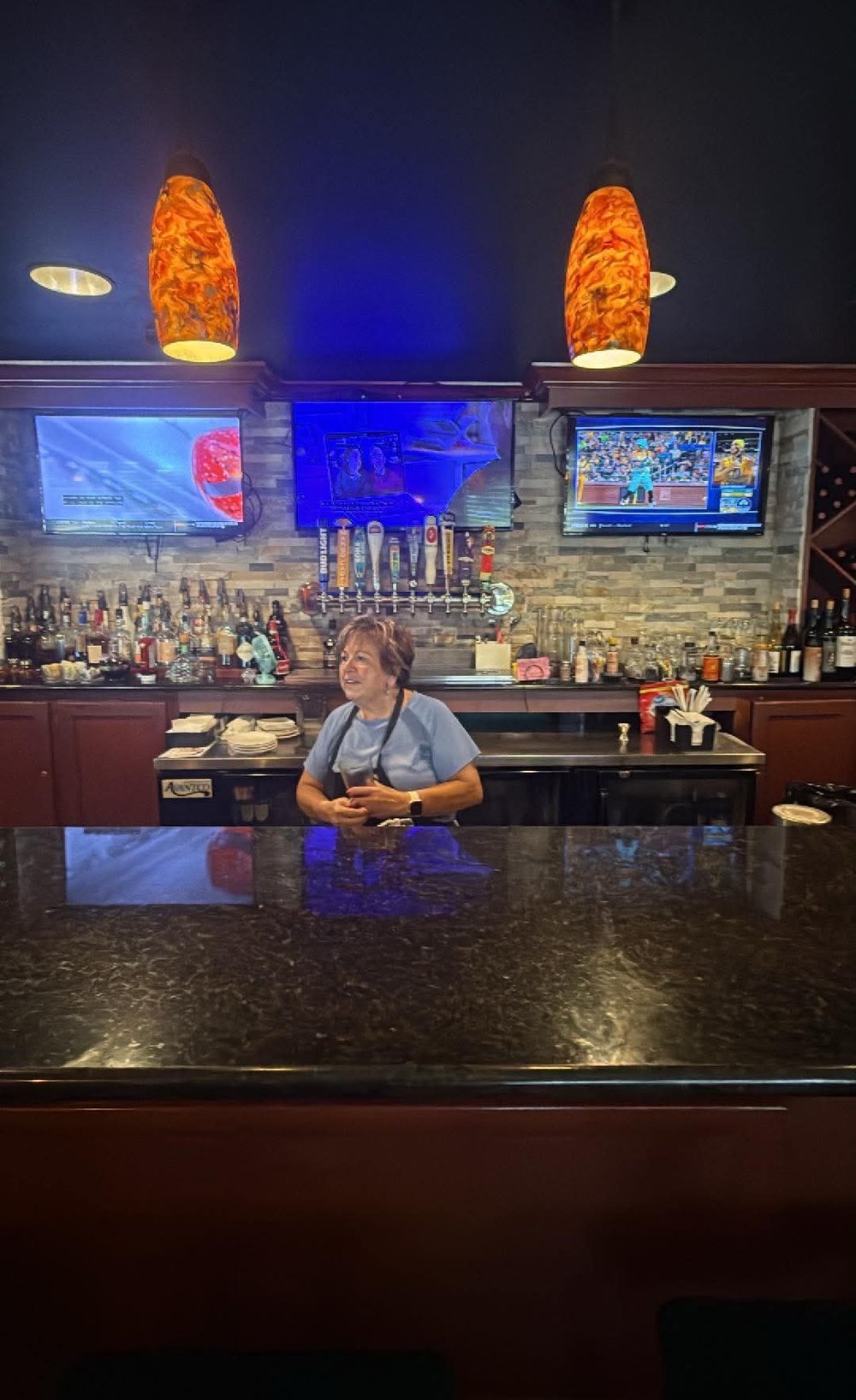 Full bar, taps, and game-day TVs