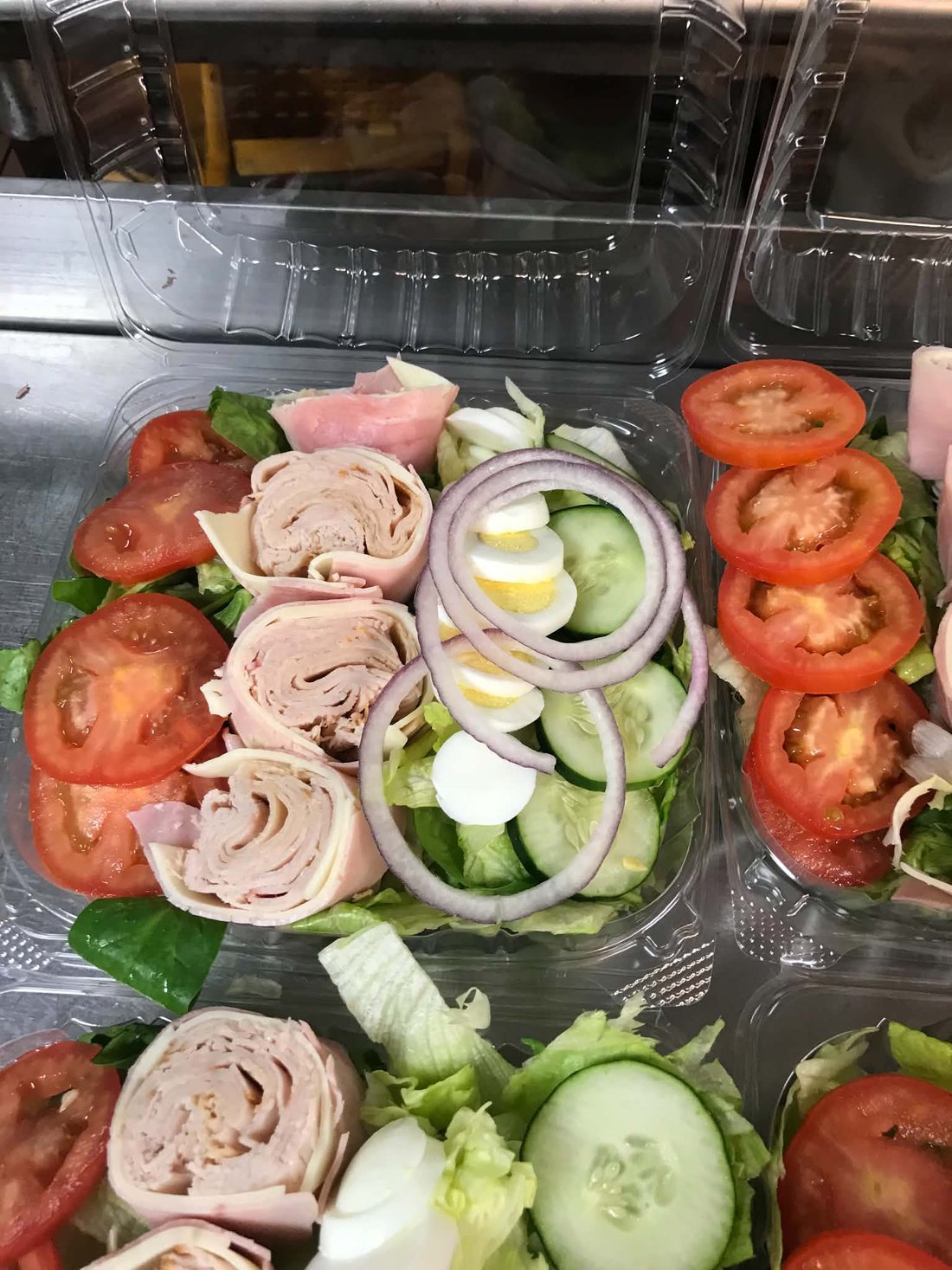 An individual boxed salad