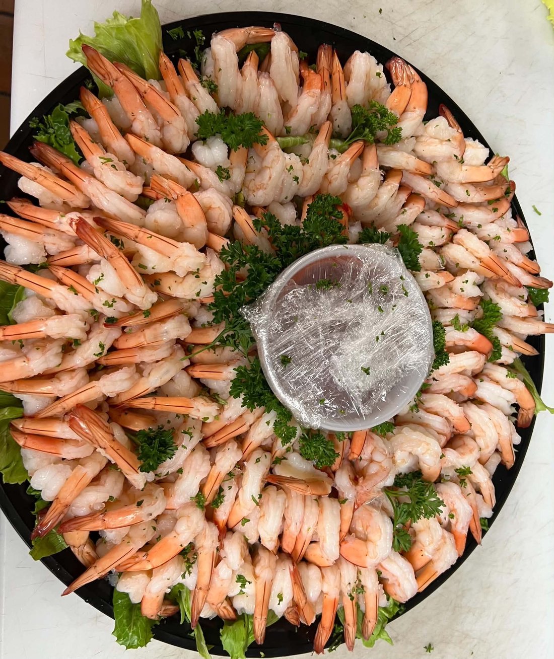 A shrimp cocktail platter for a private event
