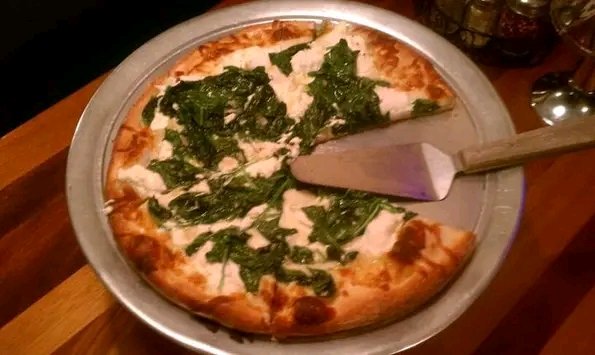 White pizza with spinach & ricotta